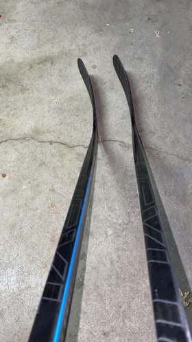 Two Right Handed P92M 77 flex Nexus League Pro Stock Hockey Sticks