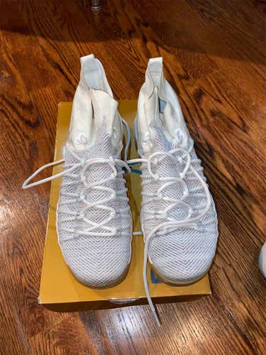 White Men's 11 (Women's 12) Nike Shoes