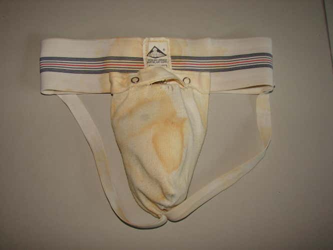 Heavily used Century martial arts jock and cup