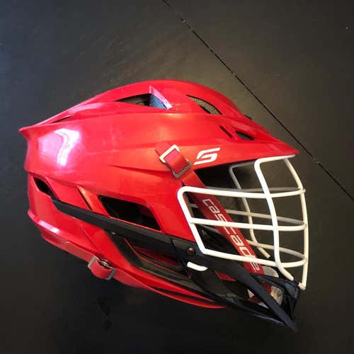 Used Cascade S Helmet. Red Shell, White Cage, Black Jaw, Red Chin Strap.
