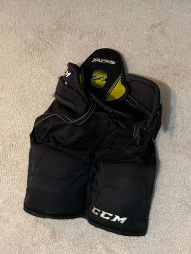 Black Used Junior Medium CCM Super Tacks Hockey Pants