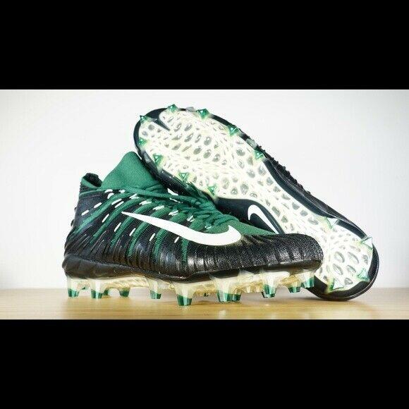 green and gold nike football cleats