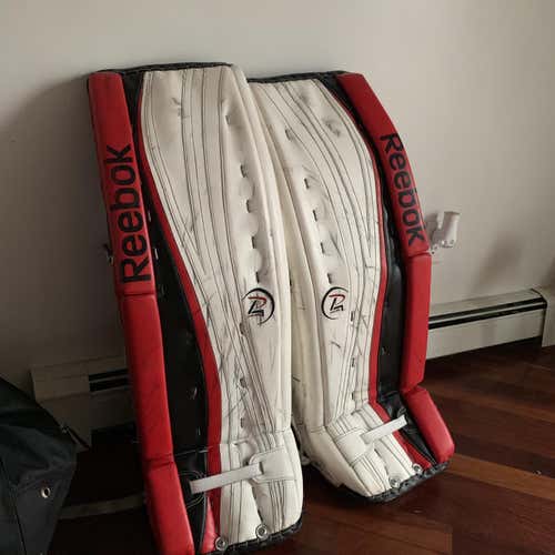 Red Used 34+2”  Reebok Premier 4 Pro Goalie Leg Pads