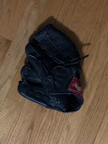 Black Used High School/College Rawlings Left Handed Outfield Heart of the Hide Baseball Glove 12"