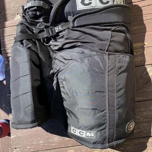 CCM Pants, Bauer SP 4000 Shoulder Pads, & Pucks