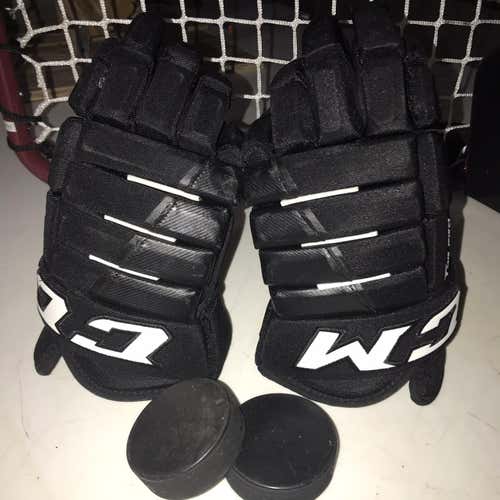 Black Used CCM Tacks 4 Roll Pro 14"  Gloves