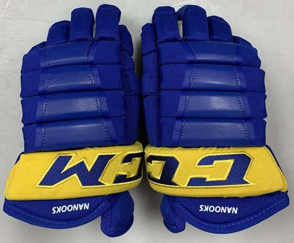 Pro stock CCM HG97 hockey gloves 13" Alaska Nanooks Royal Blue Yellow 4roll SR