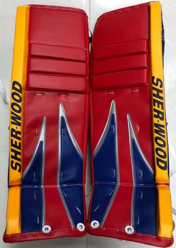 New Sherwood T100 M series Pro Stock Hockey Goalie Leg Pads 35+1 Red/Blue/Yellow