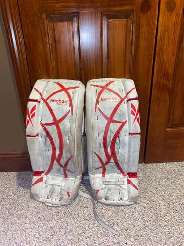 Red Used 24" Reebok Revoke 7000  Goalie Leg Pads