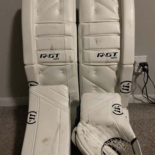 White Used 33" Warrior Ritual GT Goalie Leg Pads And Gloves