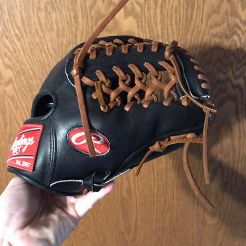 Black Rawlings Heart of the Hide 11.5" Baseball Glove