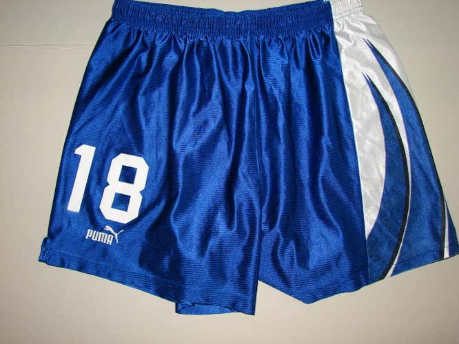 Puma soccer shorts and high school football workout shirt