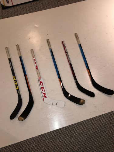 Used Knee Hockey Stick Collection