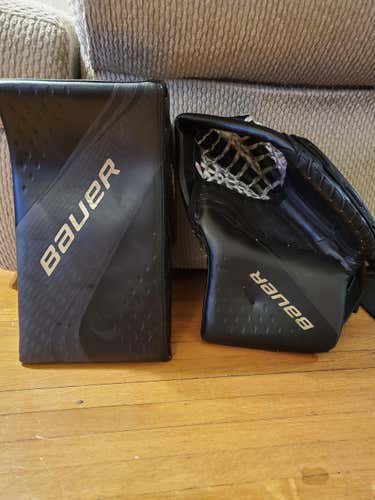 Black w gold logs Used  Bauer Regular 2X Pro Glove and Blocker