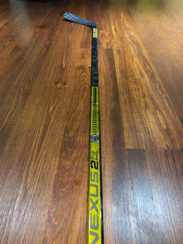 Used Left Handed Nexus 2N Pro Mid Pro Stock Hockey Stick - Gold 2n Pro 77 flex p92M curve