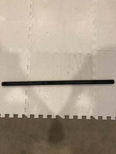 Used Warrior Shaft spray painted all black