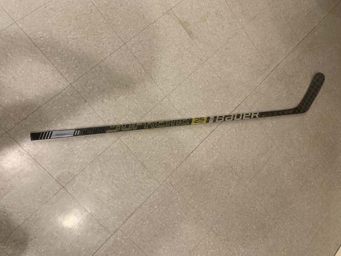 Used Senior Bauer Left Handed Supreme 2S Pro Hockey Stick Mid Pro Stock