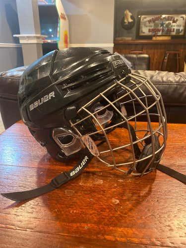 Black Used Medium Bauer Re-Akt 100 Helmet