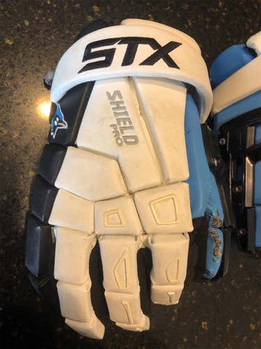 White Used STX Shield 12" Goalie Gloves