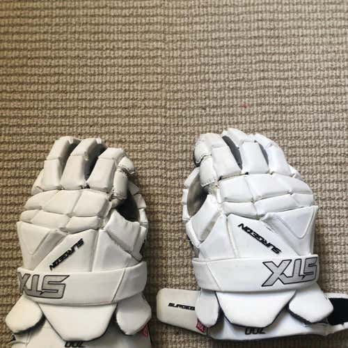 Used Surgeon 700 gloves size XL/14"