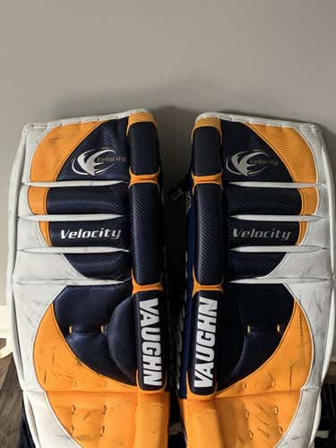 Blue/Yellow Used Junior 27" Vaughn Velocity 7200 Goalie Leg Pads