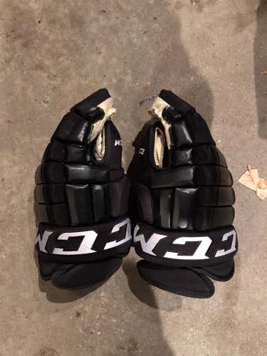 Black Used CCM HG98 14" Pro Stock Gloves from Colorado Avalanche