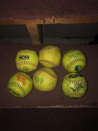 Used  6 Hard Softballs