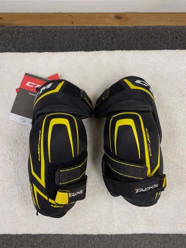 Junior New Large CCM Tacks 9040 Elbow Pads