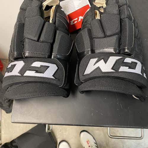 Black New CCM U+ Crazy Light 14" Pro Stock Gloves
