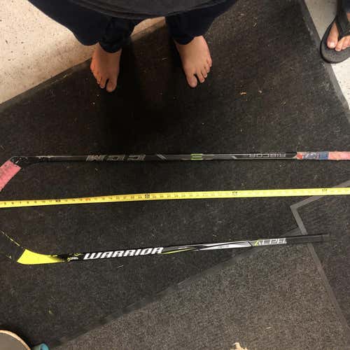 Two Used  Hockey Stick