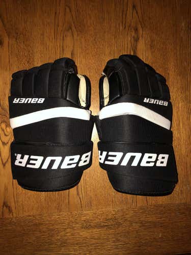 Great condition Bauer black Gloves 14"