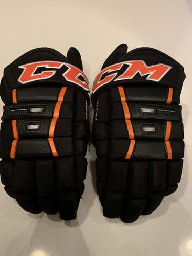 Black and Orange Used CCM Classic Pro 4-Roll Gloves 14"