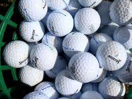 bundle of golf balls. Guaranteed titleists