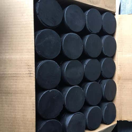 50 Hockey Pucks