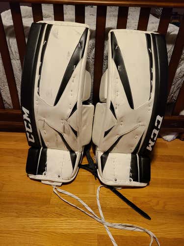 White Used Intermediate 29" CCM Revolution 577 Goalie Leg Pads