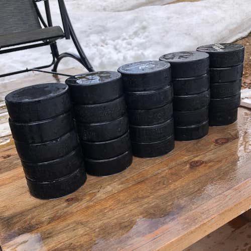 25 Very Good Used Hockey Pucks