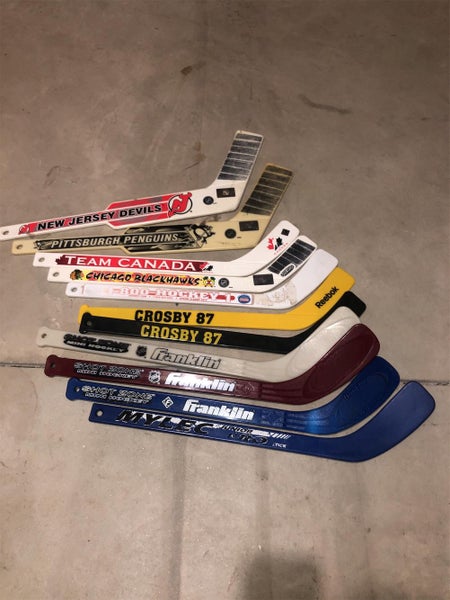 11 Knee Hockey Sticks