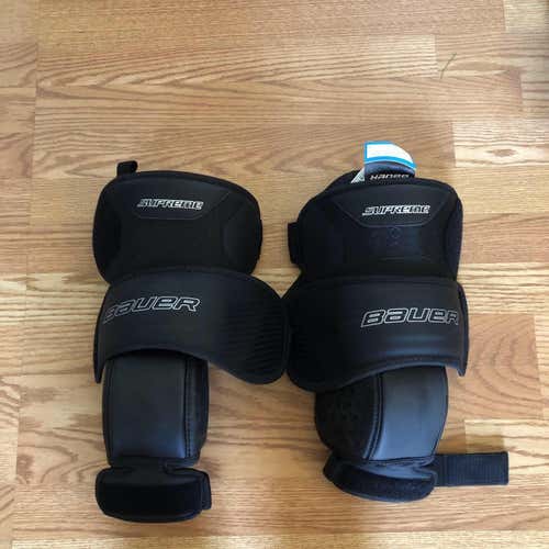 USED ONCE bauer knee guards