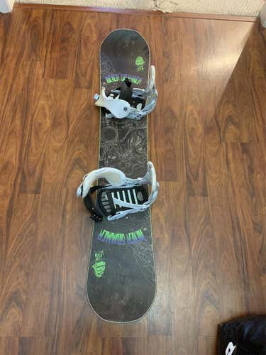 Used Never Summer Eco Snowboard With Medium Sized Binding Roughly 5 Feet Long Board
