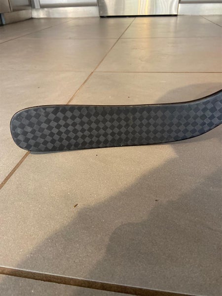 Barely Used Right Handed Covert QRE SL Mid Hockey Stick