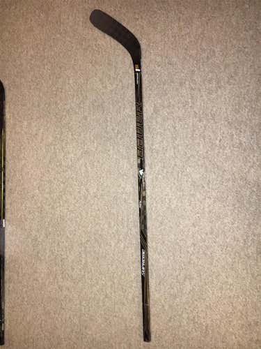 Used Left Handed Supreme 1S Mid Pro Stock Hockey Stick