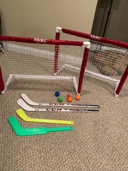 Used Mylec Knee Hockey Set with 4 sticks and Balls