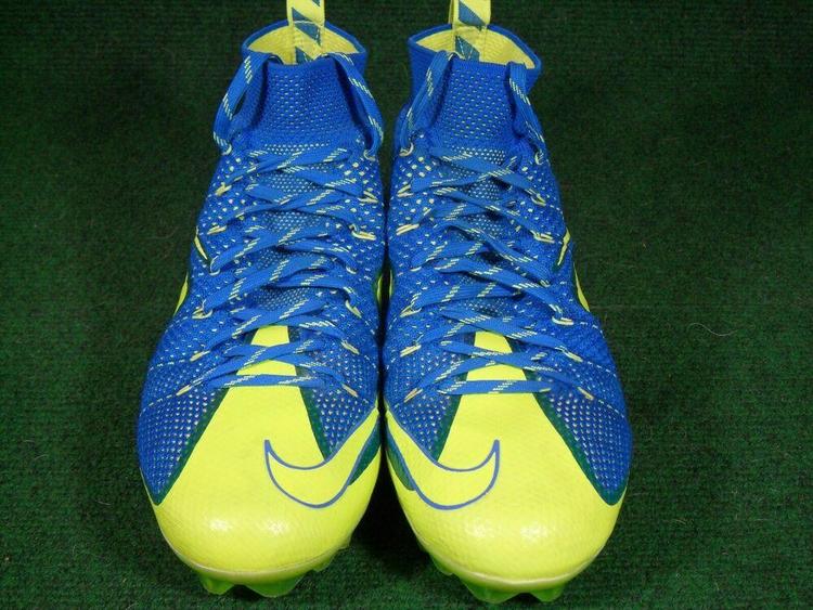 blue and yellow football cleats