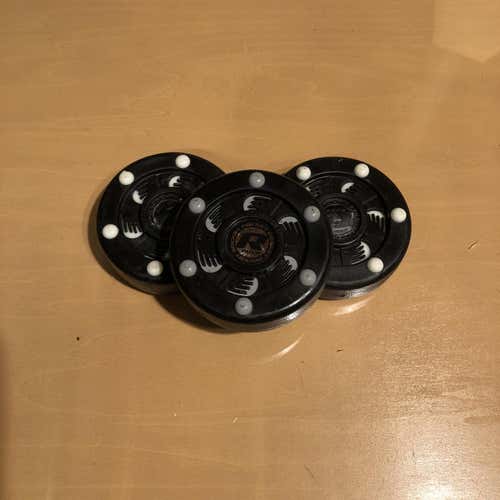 3 ROCKET Pucks.  Like New Condition.  USA