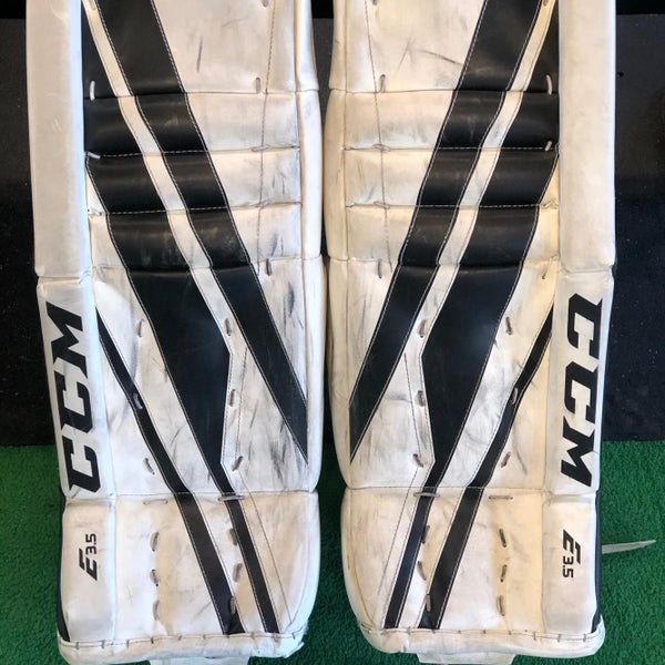 Used Wht/Blk CCM Extreme Flex E3.5 Goalie Leg Pads Youth 26" + 1