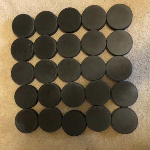 25 Hockey Pucks