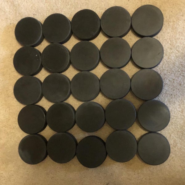 25 Hockey Pucks