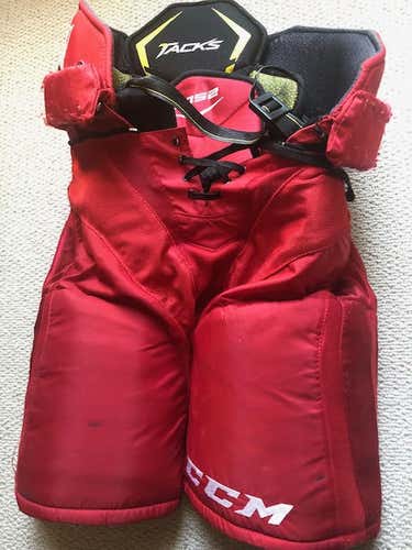 Red Used Senior Small CCM Hockey Pants