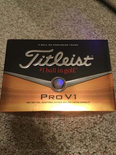 BRAND NEW *STILL IN PACKAGING** One Dozen Titleist Pro V1 Golf Balls