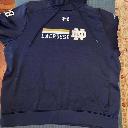 Notre Dame Team Issued Blue Sweatshirt w/ Front Pocket. ACC logo on left sleeve, 28 on right sleeve